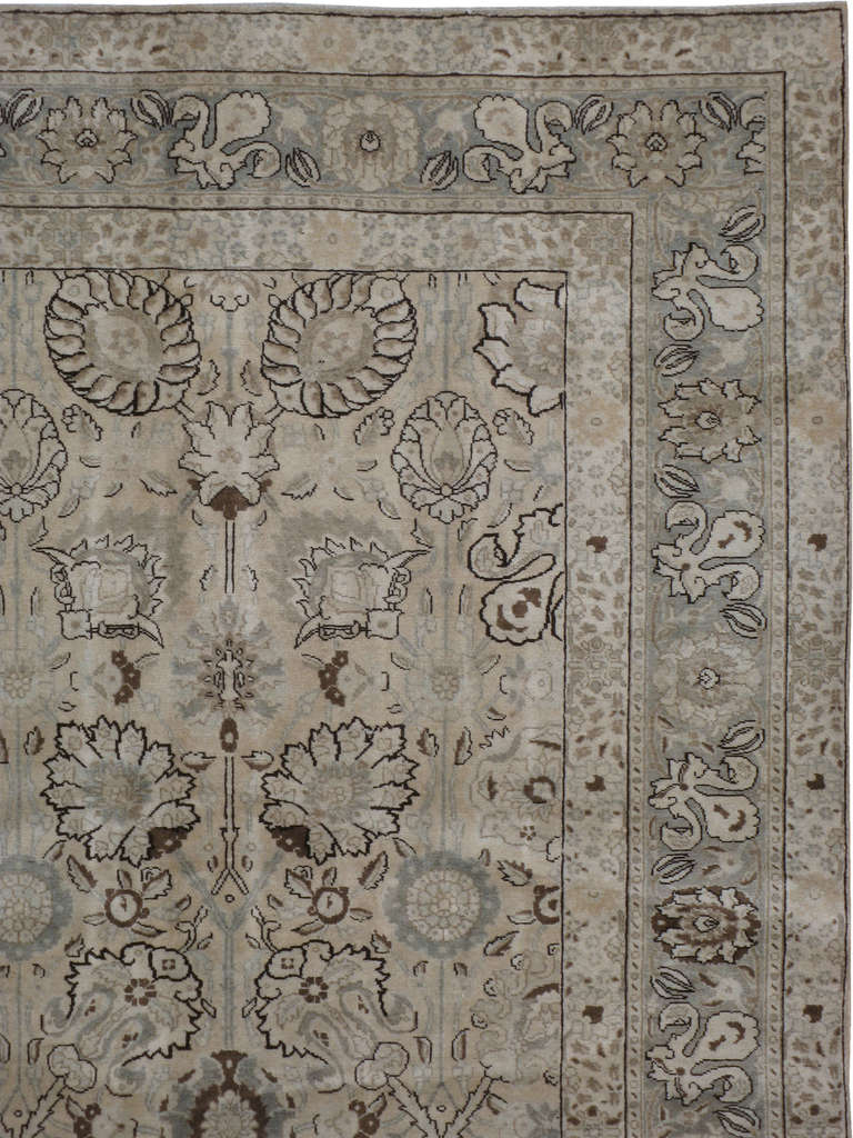 An early 20th century Persian Tabriz.  Since the 17th century, Iran started exporting artisan carpets around the world, especially to Europe.  Artists used one of the three versions of vertical looms later referred to as a Tabriz Loom.  Artists