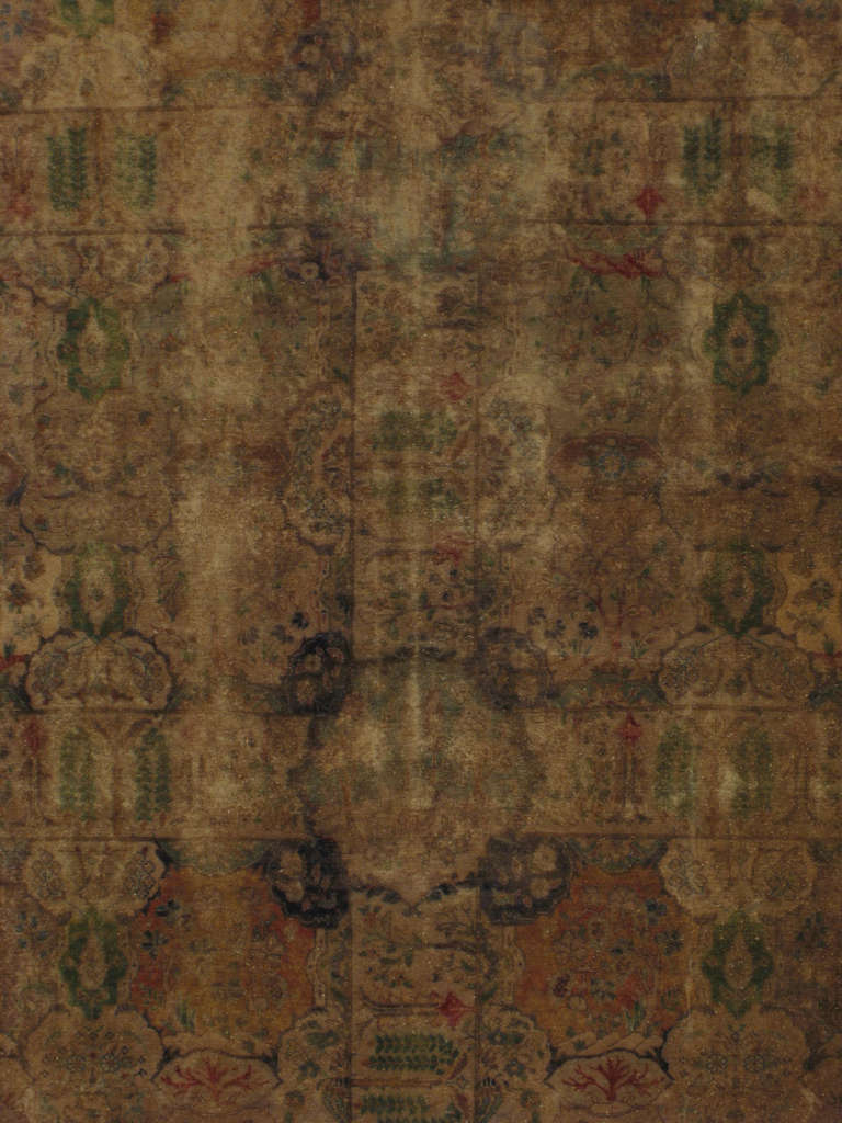An early 20th century Persian Tabriz.  Since the 17th century, Iran started exporting artisan carpets around the world, especially to Europe.  Artists used one of the three versions of vertical looms later referred to as a Tabriz Loom.  Artists