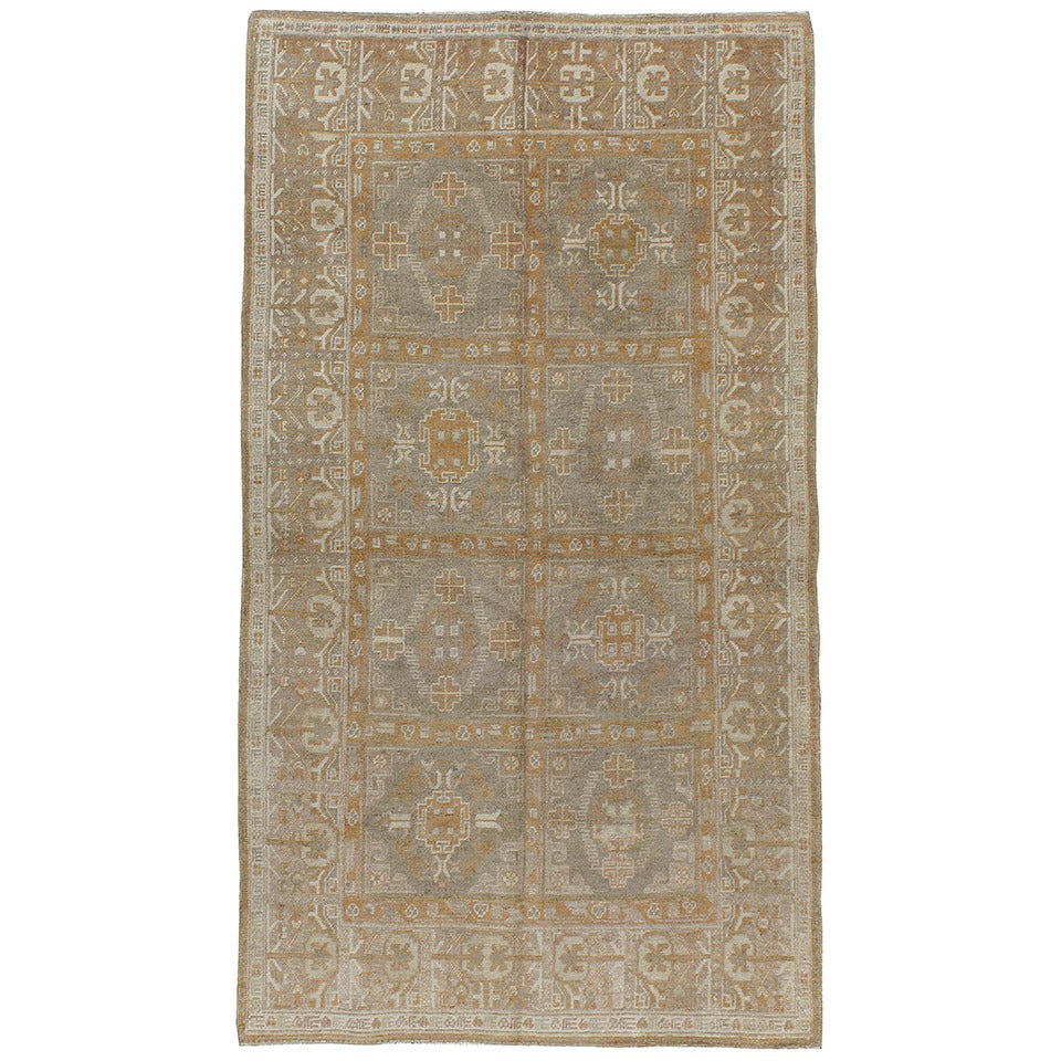 Tapis Khotan ancien du Turkestan oriental