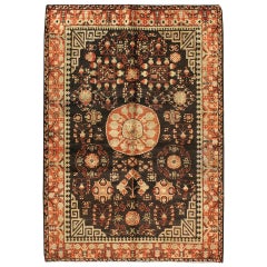 Ancien tapis Khotan du Turkestan oriental