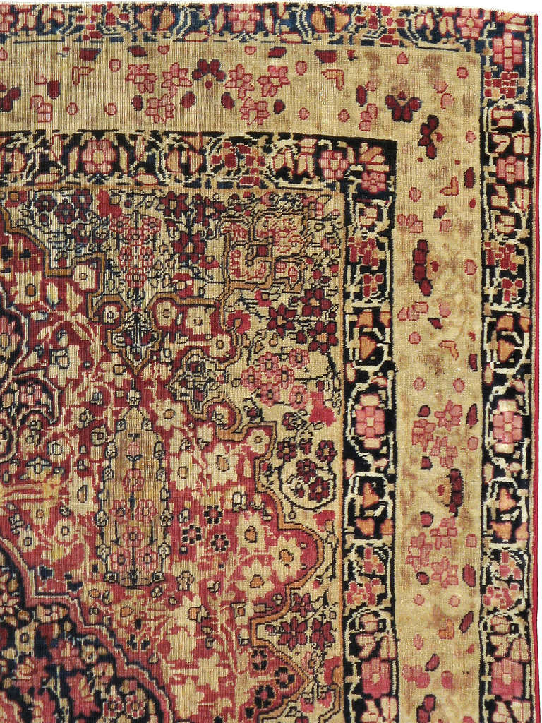A late 19th century Persian Lavar Kerman carpet.