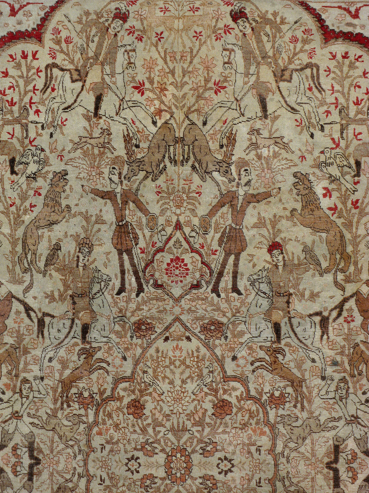 An antique Persian Tabriz carpet from the turn of the 20th century depicting a pictorial design of a Persian hunting ground. 

Antique and vintage animal rugs are desired for both its decorative appeal and character because of the great