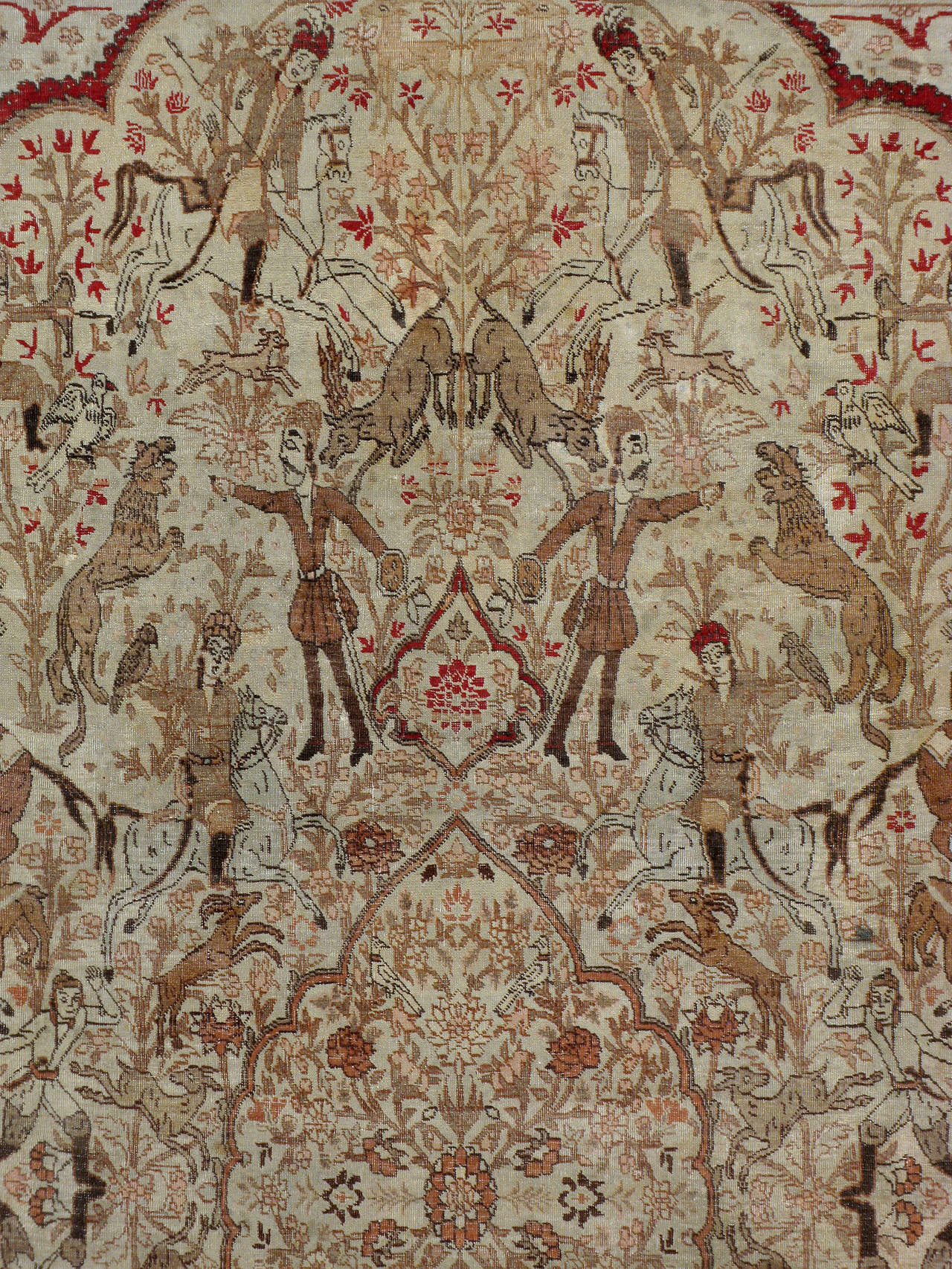 An antique Persian Tabriz carpet from the turn of the 20th century depicting a pictorial design of a Persian hunting ground. 

Antique and vintage animal rugs are desired for both its decorative appeal and character because of the great