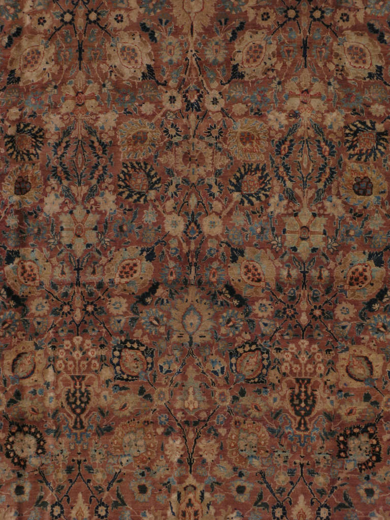 An early 20th century Persian Tabriz.  Since the 17th century, Iran started exporting artisan carpets around the world, especially to Europe.  Artists used one of the three versions of vertical looms later referred to as a Tabriz Loom.  Artists