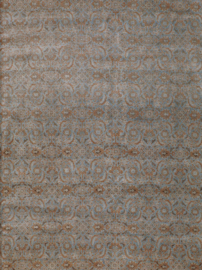 Un Tabriz persa de principios del siglo XX.  Desde el siglo XVII, Irán empezó a exportar alfombras artesanales a todo el mundo, especialmente a Europa.  Los artistas utilizaban una de las tres versiones de telares verticales que más tarde se