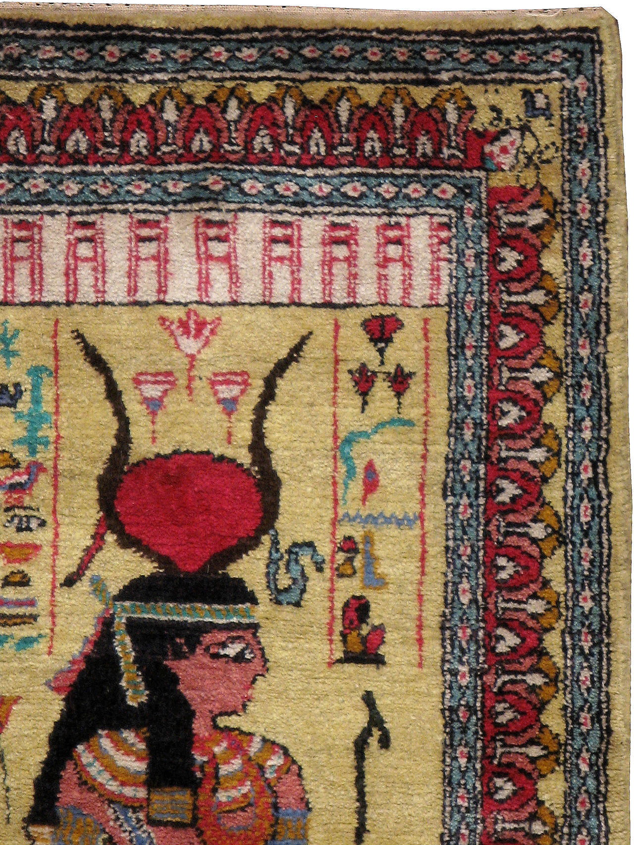 A vintage pictorial carpet from the mid-20th century depicting the ancient Egyptian Goddess Isis and Goddess Hathor.