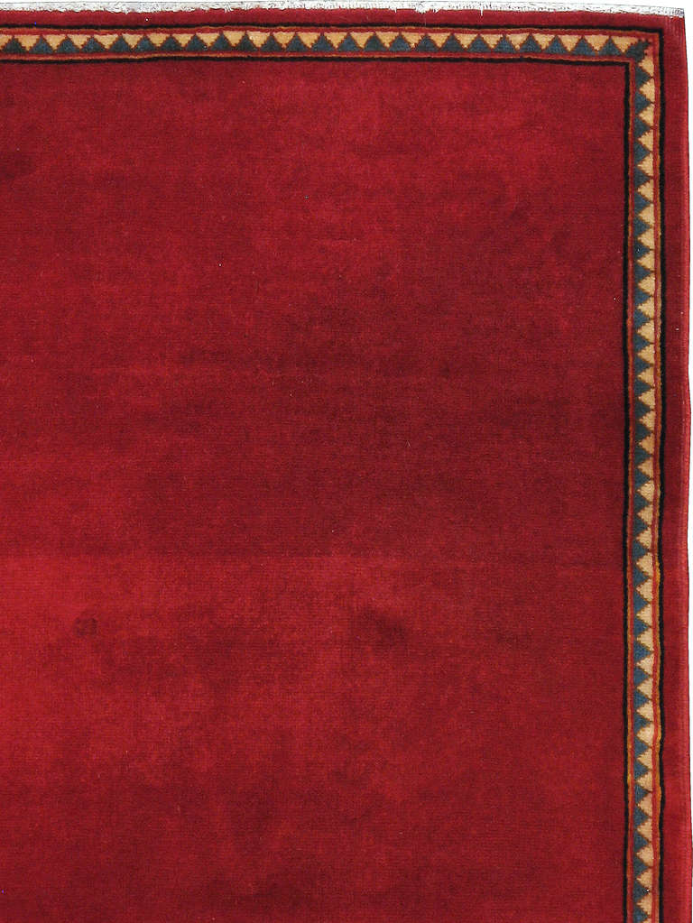 A second quarter mid-20th century Persian Kashan carpet.