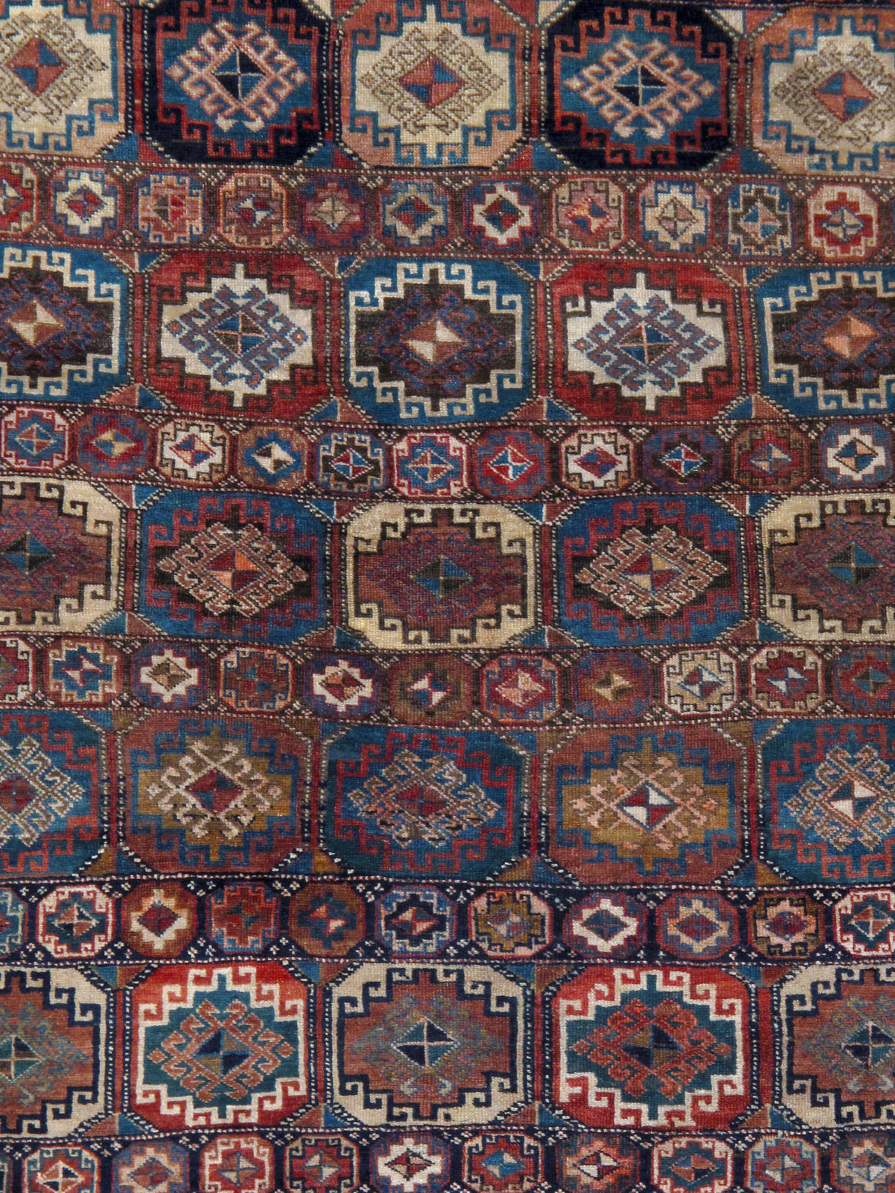 An antique North West Persian carpet from the first quarter of the 20th century.