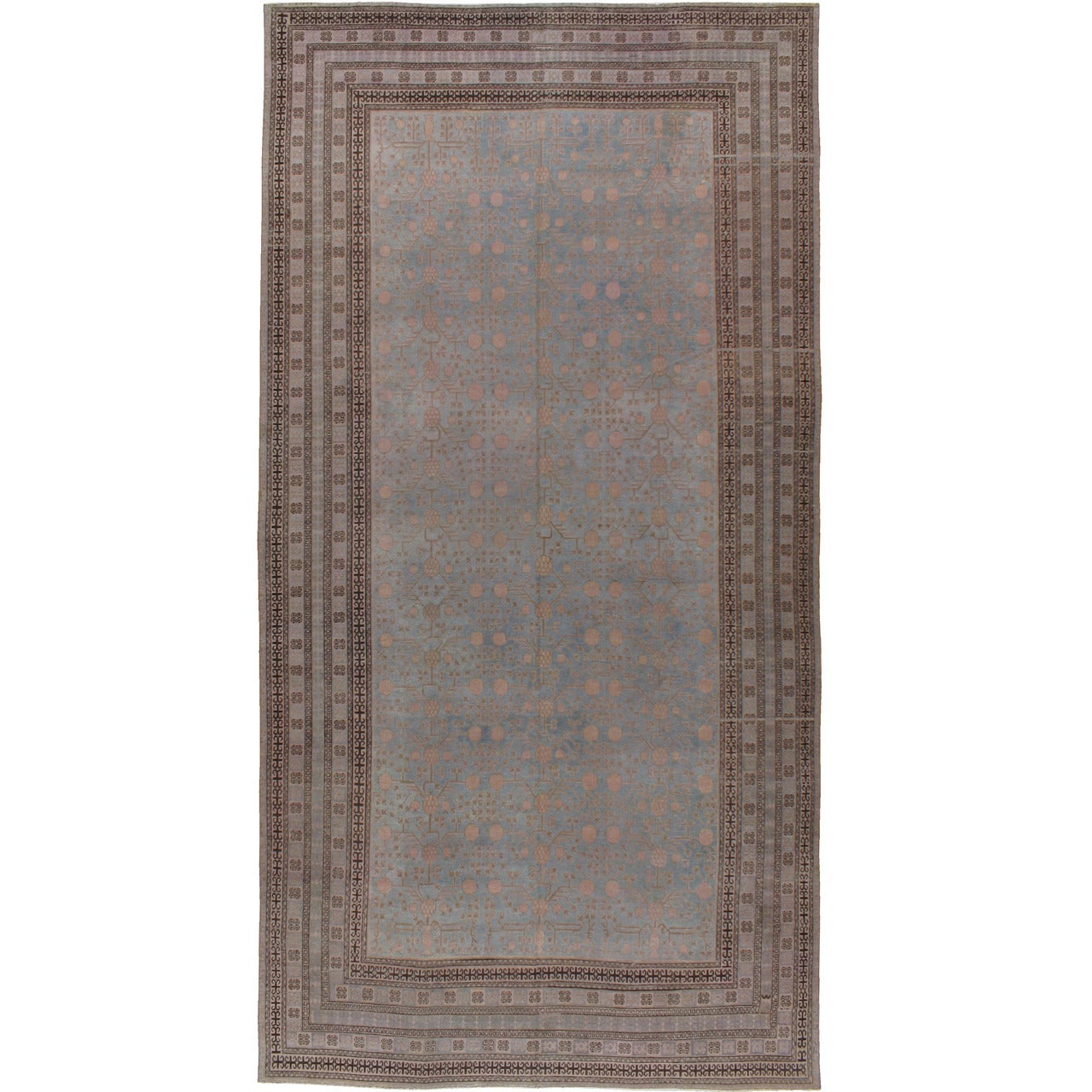 Tapis Khotan ancien du Turkestan oriental