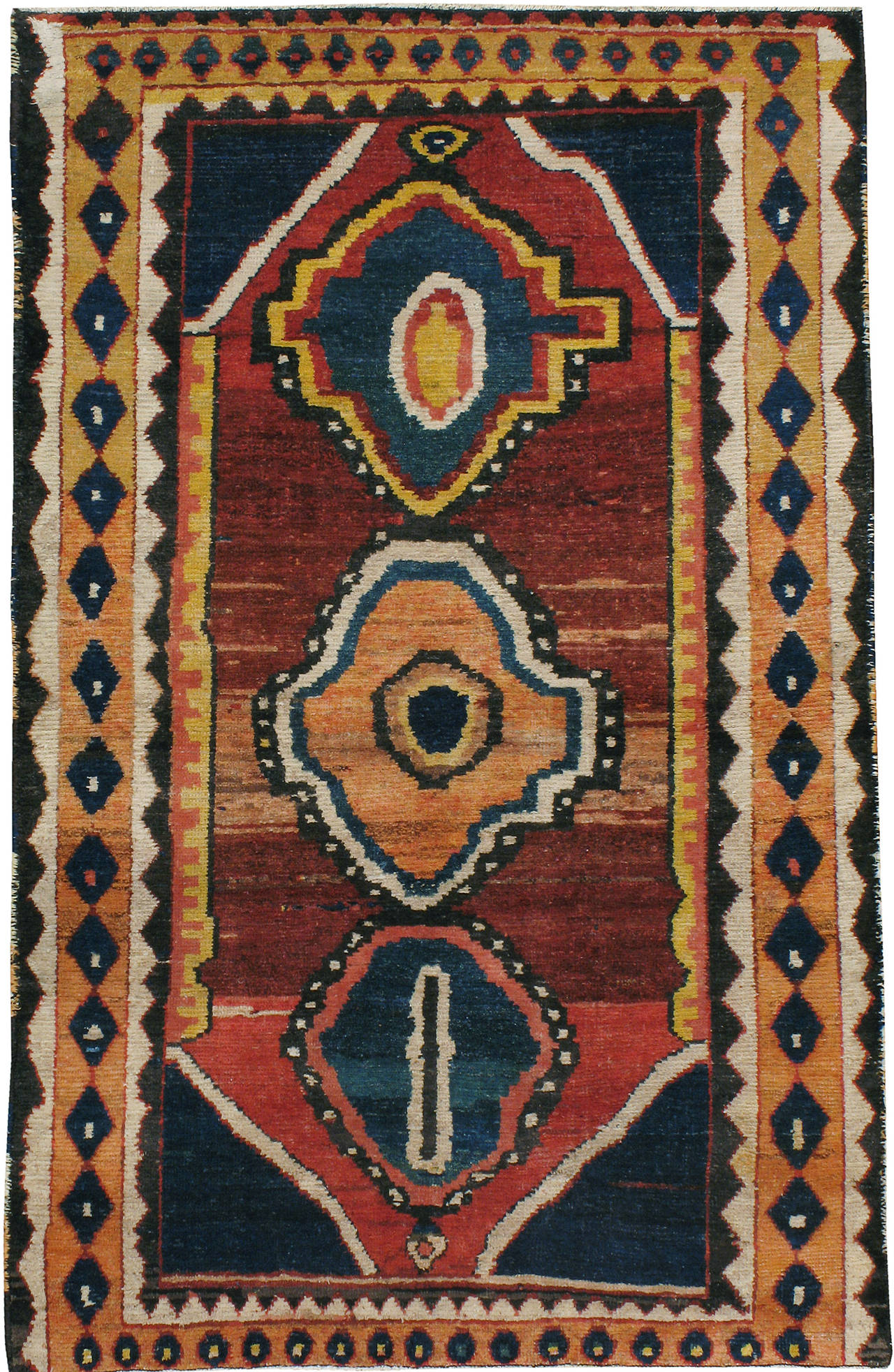 An early 20th century Persian Gabbeh carpet. A cheerful Gabbeh, woven by the nomads in the southwestern region of Persia.
