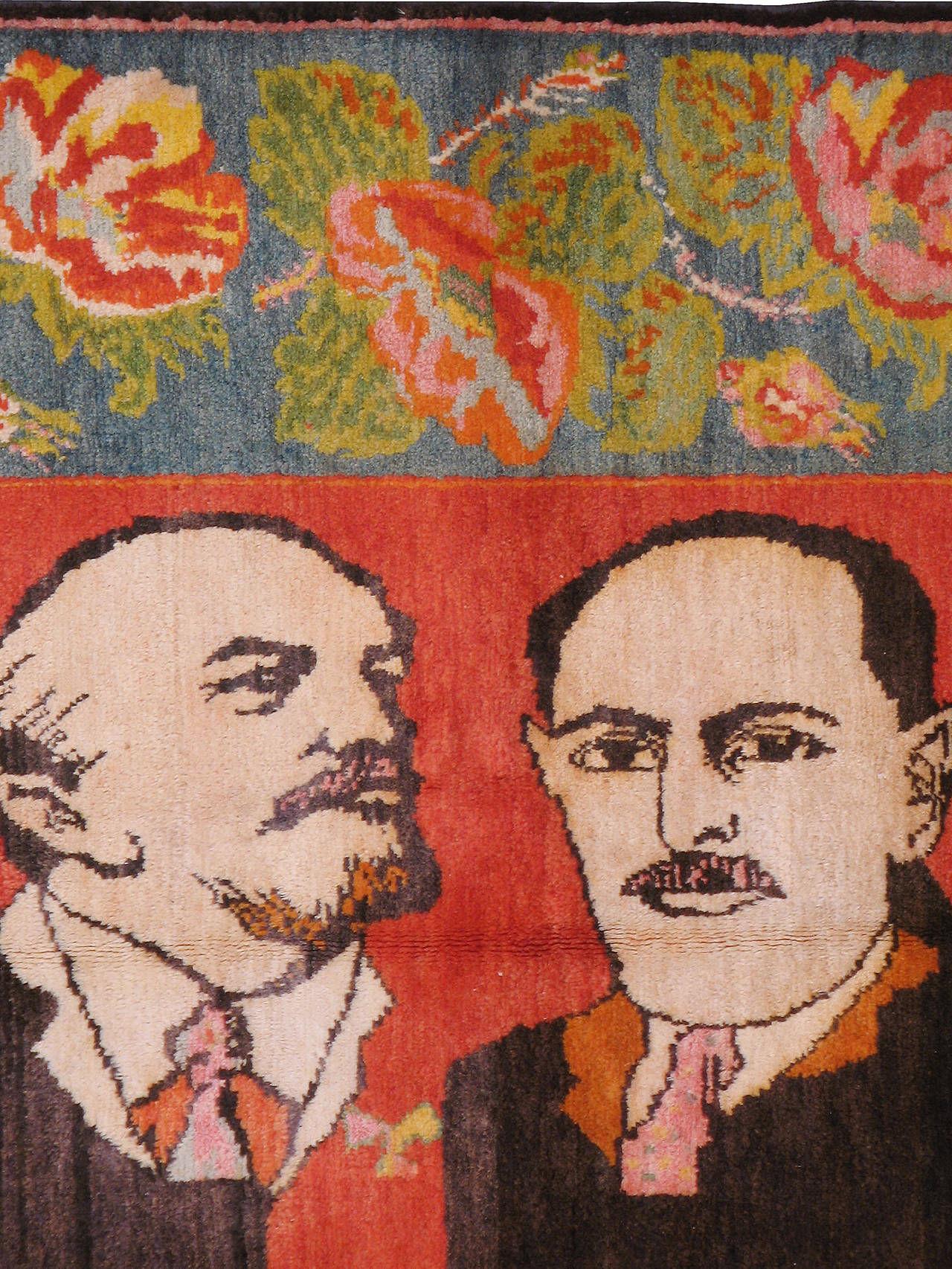 A vintage Russian Karabagh carpet from the second quarter of the 20th century with a pictorial depiction of Vladimir Lenin.