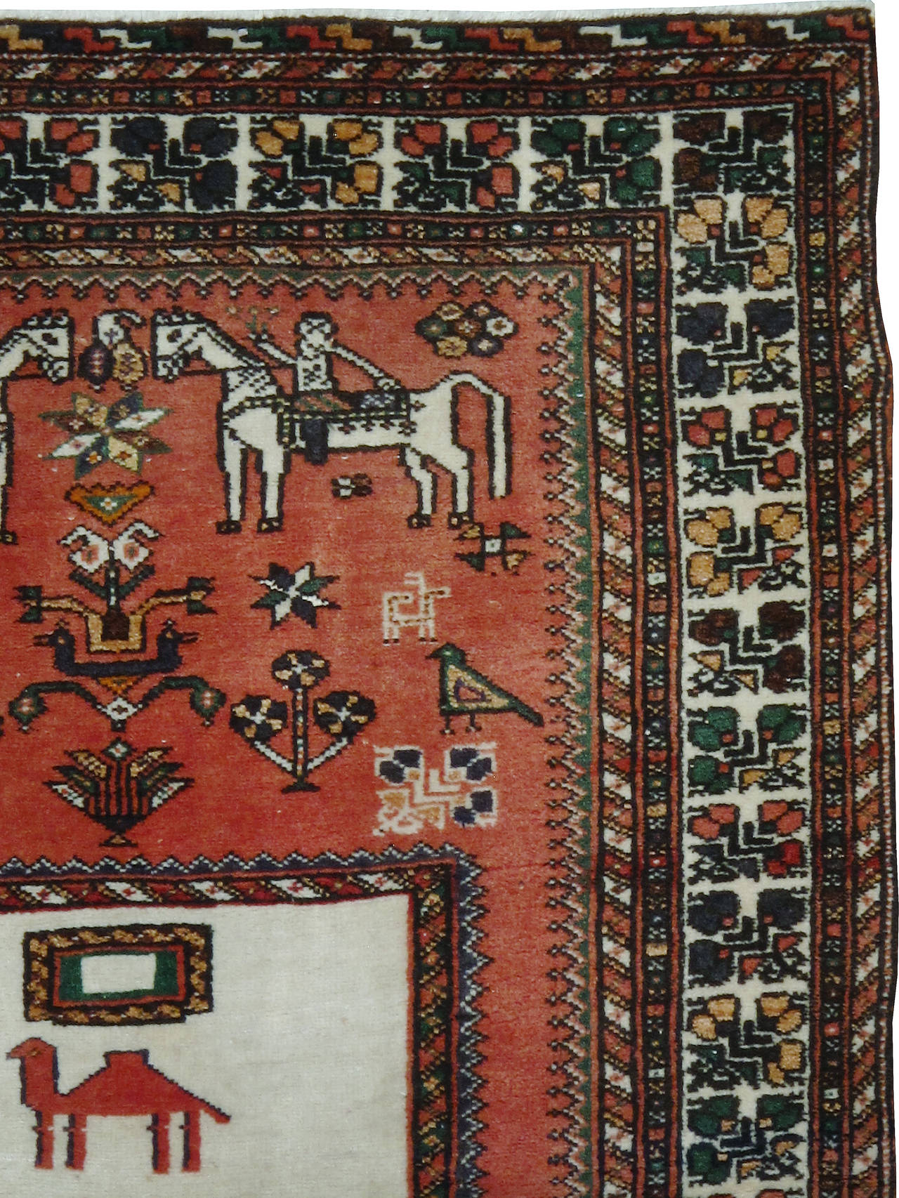 A vintage northwest Persian carpet from the second quarter of the 20th century with a pictorial design.