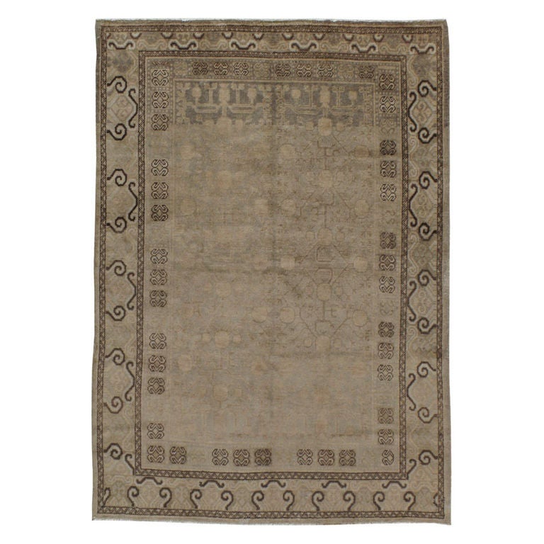 Tapis Khotan ancien du Turkestan oriental
