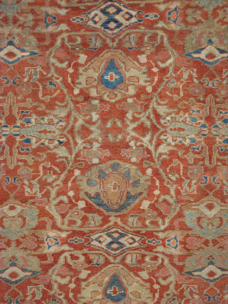 Ein persisches Mahal aus dem frühen 20. Jahrhundert.  Mahal-Teppiche gibt es sowohl mit Stammes- als auch mit kurvilinearen Motiven.  Dieses Attribut leitet sich von der einzigartigen Lage der Stadt Mahallat ab, die zwischen den Städten Arak und