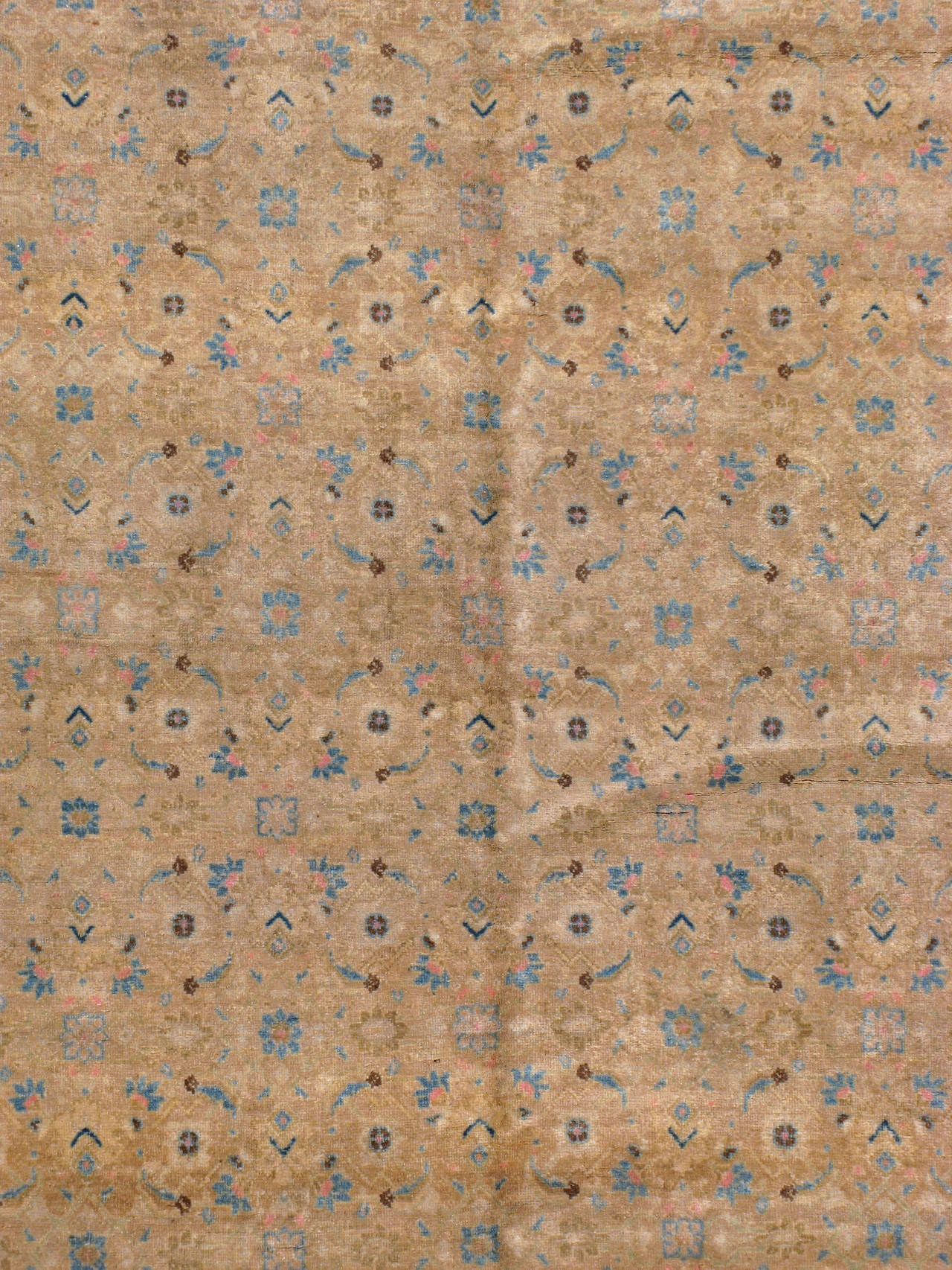 A second quarter, Mid-Century Persian Mahal antique washed carpet. Mahal carpets are found with both tribal and curvilinear motifs. This attribute derives from the unique position of the city of Mahallat, which is between the cities of Arak and