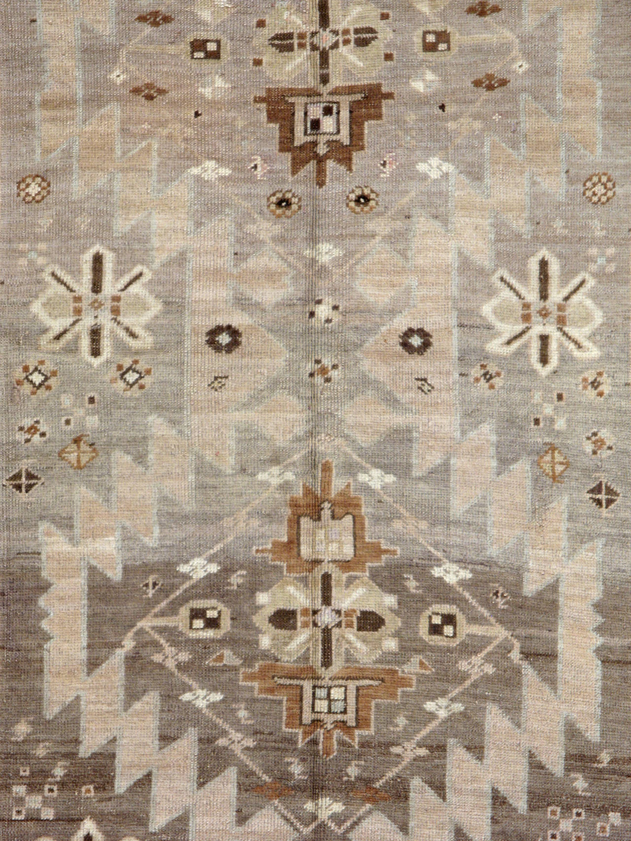 An antique Russian Karabagh gallery carpet from the first quarter of the 20th century.
