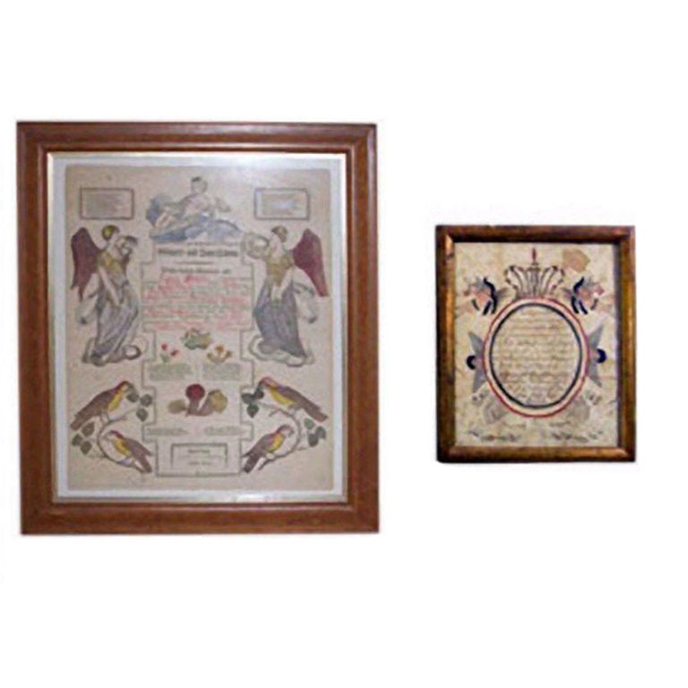 Framed documents employing the Fraktur type of lettering. These illustrated manuscripts, are drawn with pen and ink and are embellished with vivd colors. The large document is 20.5