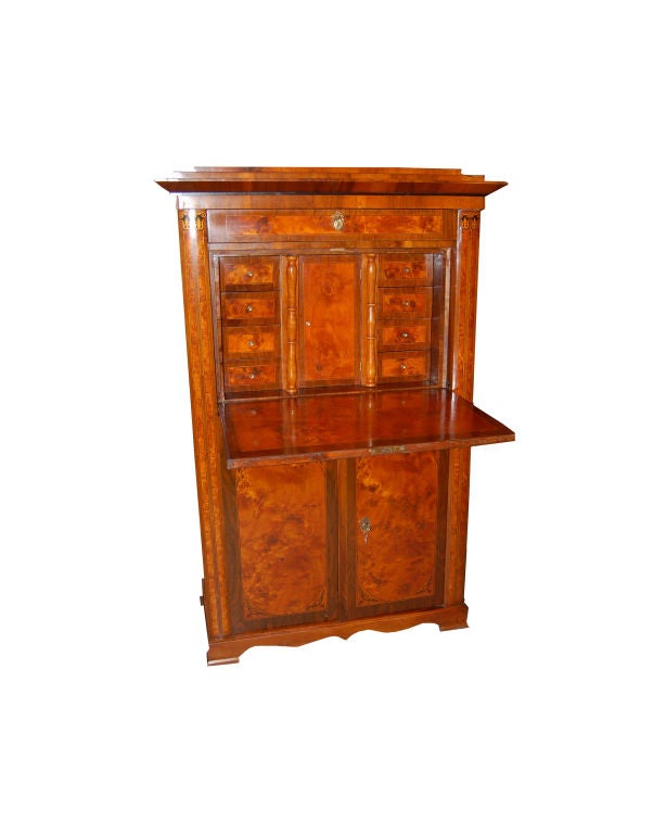 Biedermeier Secretaire with fall front writing surface, interior drawers and hidden compartments.