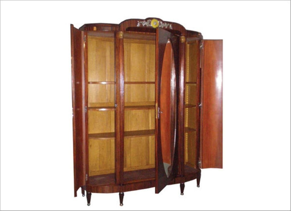 French Art Deco Armoire – zebrawood and amboyna burl with three doors, interior shelves, Mother of Pearl and nickel plated hardware, center door with large oval mirror.