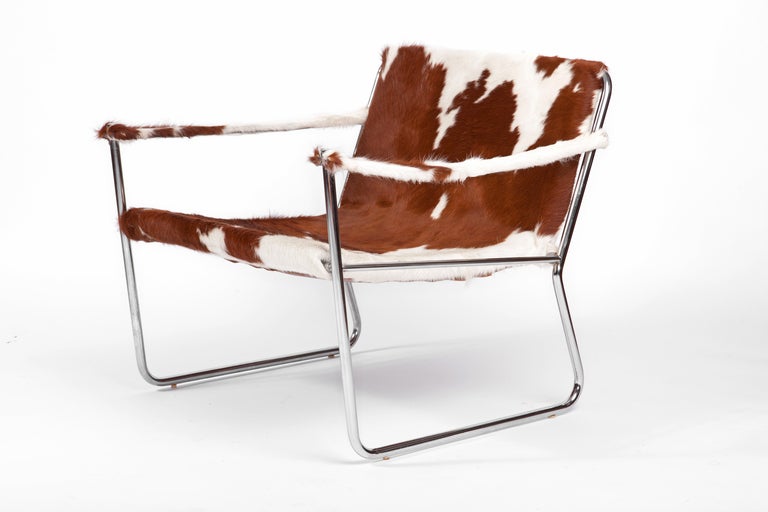 Mid-Century Modern 1960s Lounge Chair and Ottoman in Cowhide