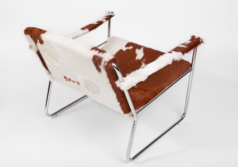Mid-20th Century 1960s Lounge Chair and Ottoman in Cowhide