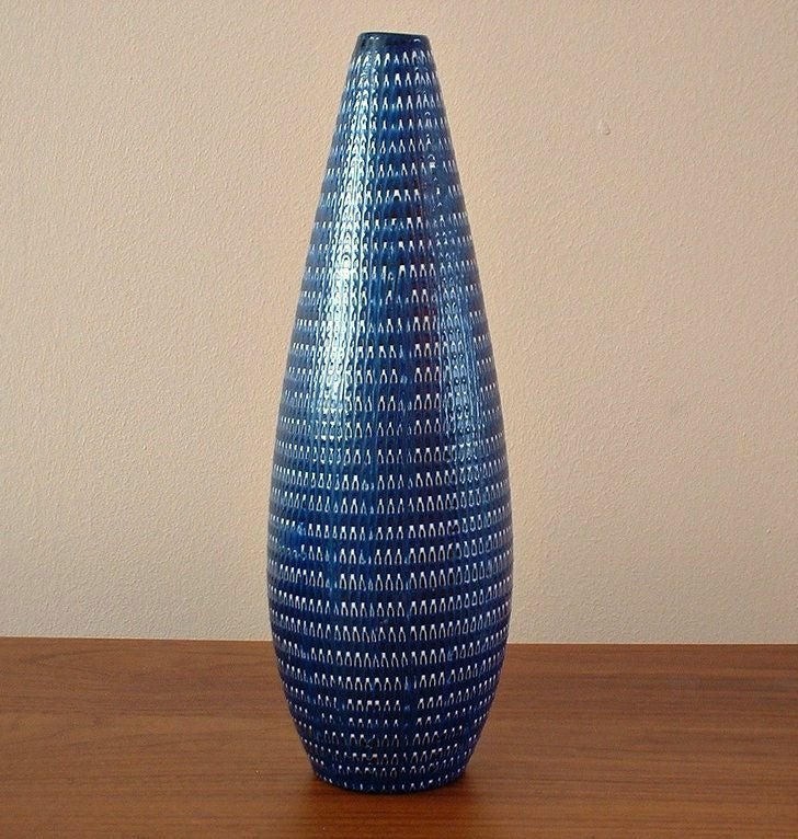 A superb, conical-form vase with a textured surface in a basket-weave pattern, executed in layers of black, navy blue and white glazes. Designed by Esta Huttner Brody in 1953 for Hyalyn Porcelain, well-known and esteemed in their time for ceramics