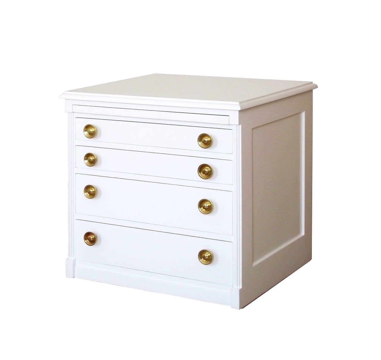 A very chic and highly functional pair of solid wood, small chest s of drawers in a white, semi-gloss lacquer, each with four drawers (two shallow and two deeper), a pull-out shelf at top, solid brass pulls and concealed casters. Clean, classic
