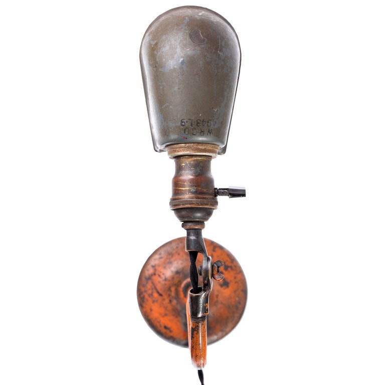 All original laboratory lamp by OC White circa 1930, signed. Classic industrial aesthetic rendered a bit less austere by its bright orange enamel which shows its age but is still largely intact. Great patina all around. Newly rewired