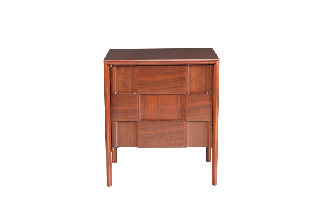*Offered on sale for one week only.

A handsome pair of nightstands executed in walnut and birch woods with opposing horizontal/vertical veneers that emphasize the geometric design. Each has a single adjustable shelf to the interior and the pair has