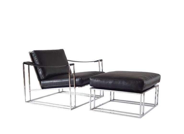 Sleek lounge chair and ottoman designed by Milo Baughman for Thayer Coggin in 1972, originally purchased at Bloomingdale's. Chair comprises a highly geometric frame in chromed steel that supports a 'floating' seat and backrest along with strap