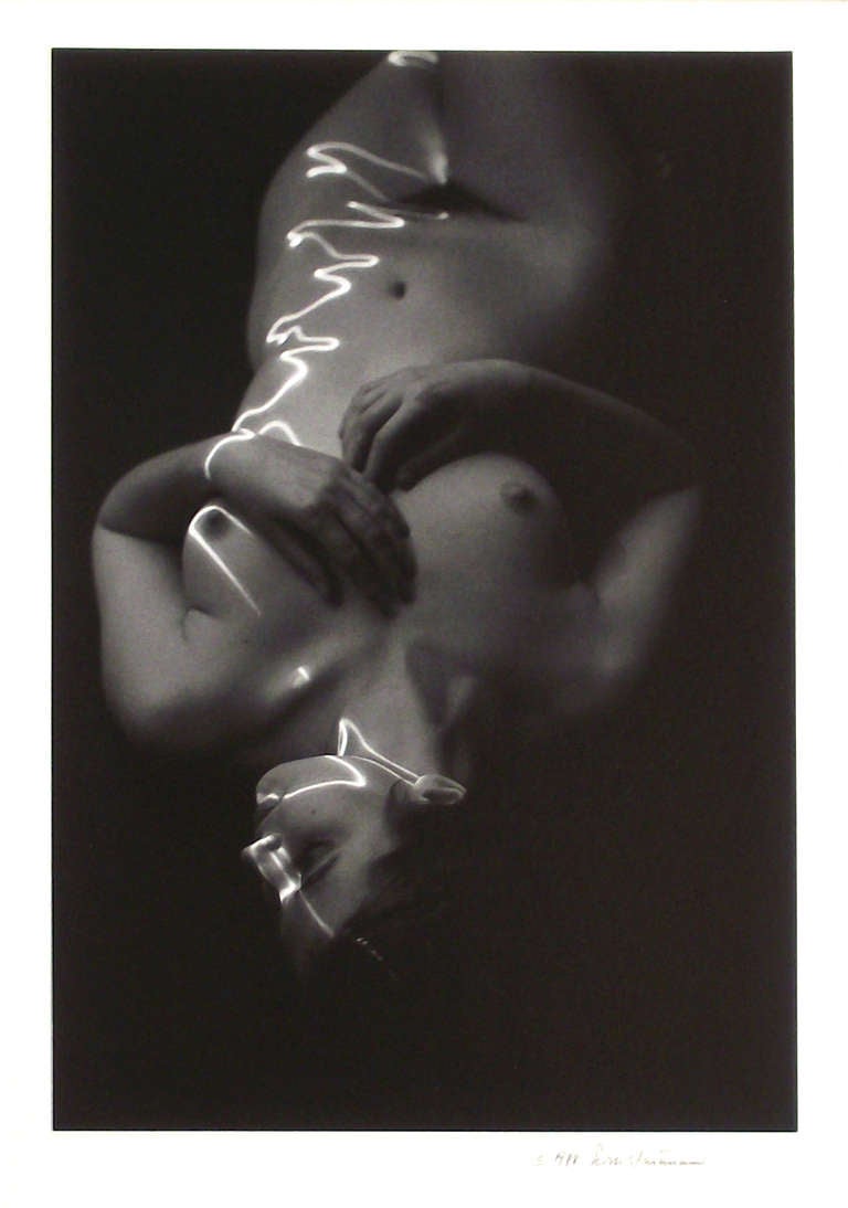 An original silver gelatin photograph by Erich Hartmann (American/German, 1922-1999) from his 'Writing With Light' series. It is presented in its original matte and frame, signed and dated by Hartmann at matte's lower right corner. Rare to market.
