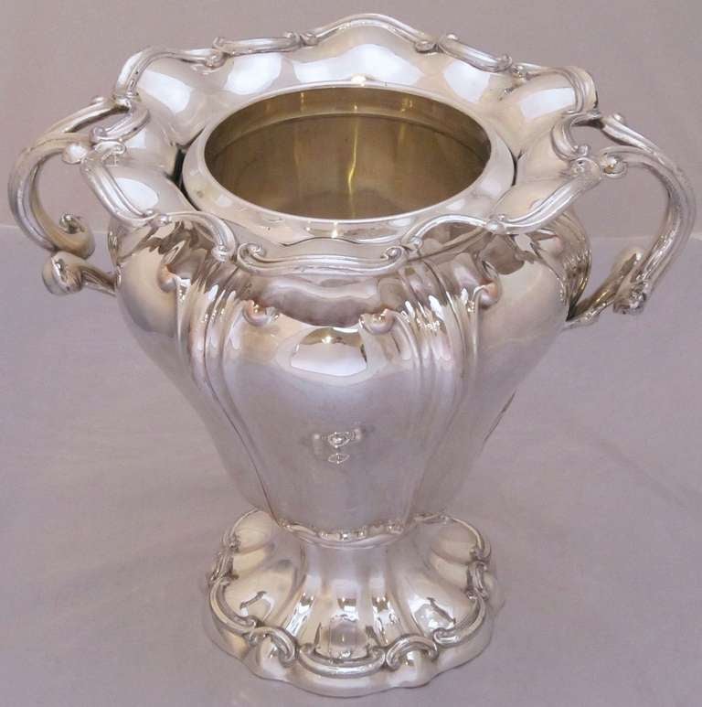 A beautiful English wine cooler of Sheffield plate silver with removable liner