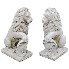 Pair of English Garden Stone Seated Lions