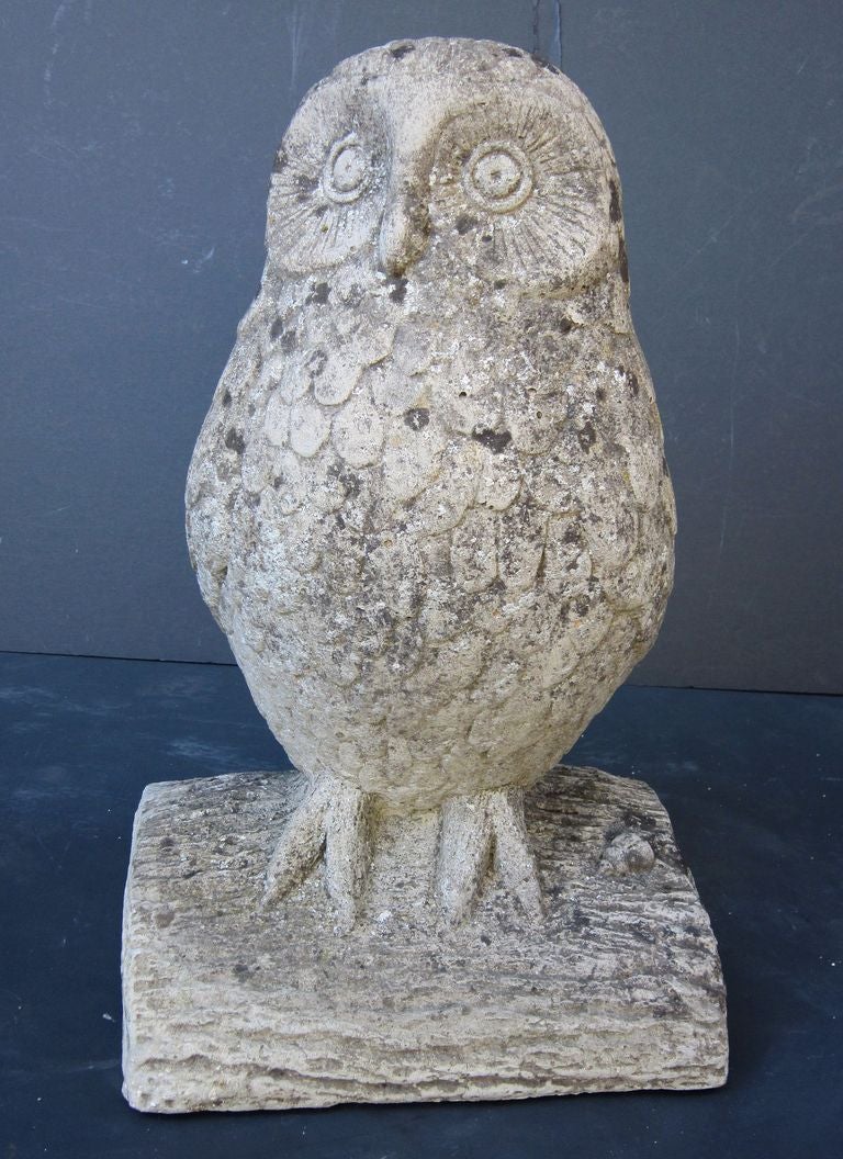 A large English garden ornamental figure of an owl, in the round, of composition stone. Featuring fine detail to the eyes and feathers, sitting on a faux bois base.

Perfect for a garden room or conservatory