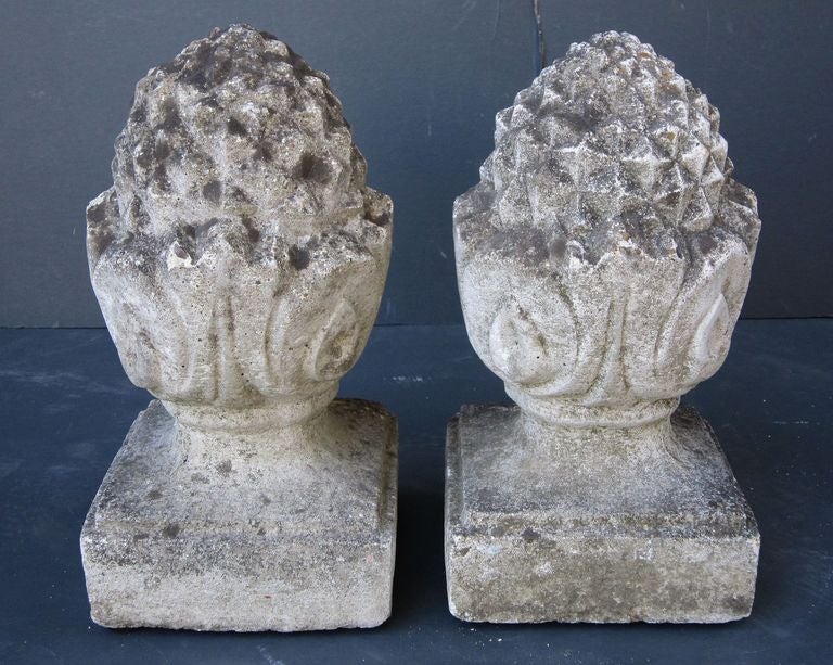 A pair of English garden ornamental finials, of composition stone,  in the form of artichokes on square plinth bases.

Perfect for a garden room or conservatory.

Priced as a pair: $1795 pair
