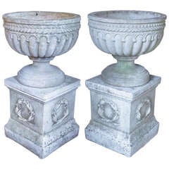 Pair of Large English Garden Stone Urns on Plinths (Priced as a Pair)