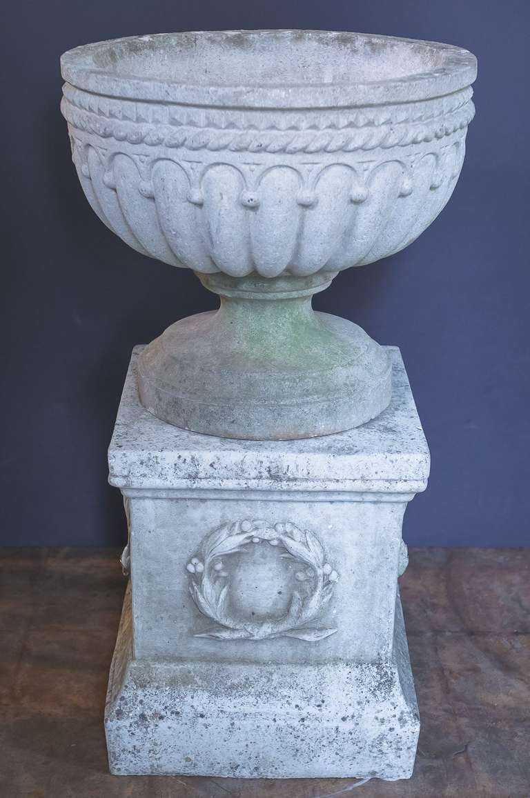 20th Century Pair of Large English Garden Stone Urns on Plinths (Priced as a Pair)