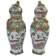 Pair of Lidded Famille Rose Chinese Export Vases