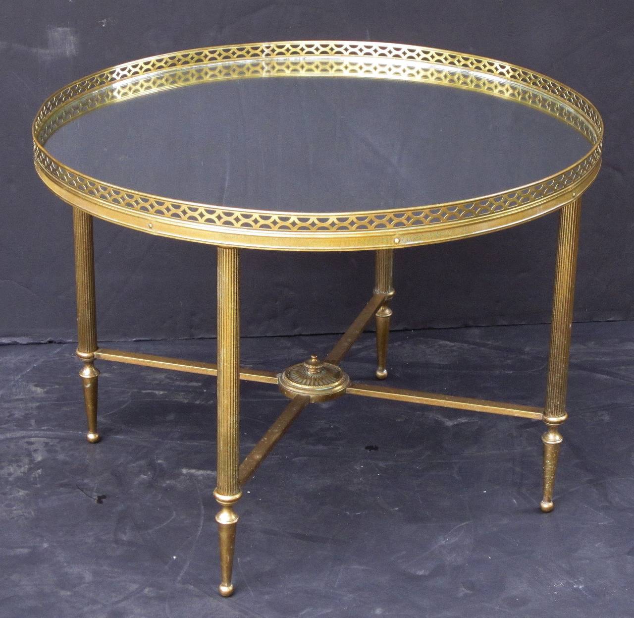 A fine French low table of brass (23 3/4