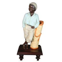 Folk Art Chalkware Figure of a Black Golf Caddy or Caddie