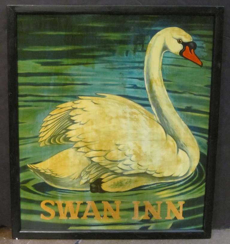 An authentic English pub sign (one-sided) featuring a painting of a swan upon water, entitled: Swan Inn

A very fine example of vintage advertising artwork, ready for display.