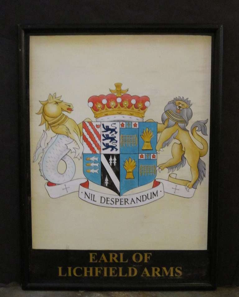 An authentic English pub sign (one-sided) featuring a painting of the heraldic arms of the Earl of Lichfield, entitled: Earl of Lichfield Arms.

Dimensions: height 48 inches x width 36 inches x depth 2 inches

A very fine example of vintage