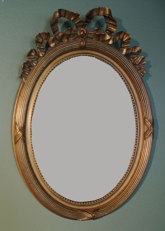 Pair of French Oval Gilt Mirrors with Ribbon Design 1