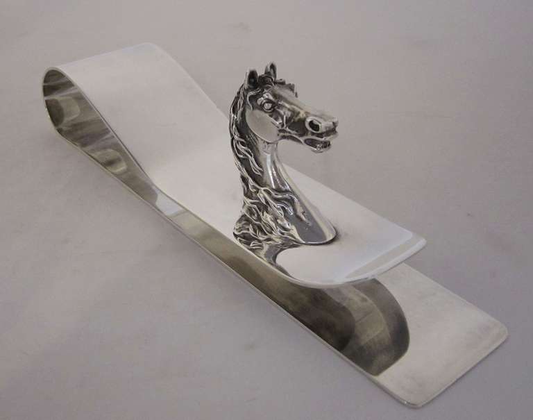 A large silver paper holder or desk clip by the celebrated fashion house, Hermes - Paris, featuring a handsomely modeled bust of a horse.

Marked: Hermes.Paris - Made In France on back

A lovely accessory for the desk or table.