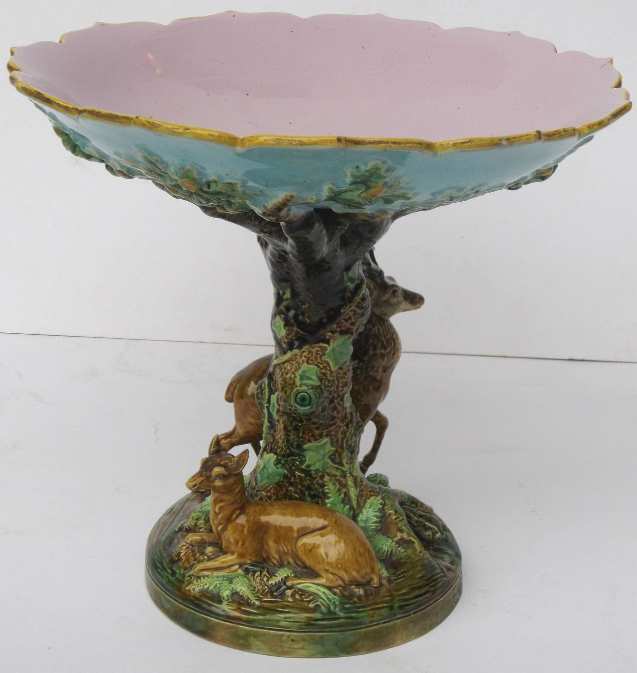 A rare Majolica deer compote (or comport) table center from the Continents series (also called the Continental series) by the celebrated English pottery firm, George Jones. Entitled 