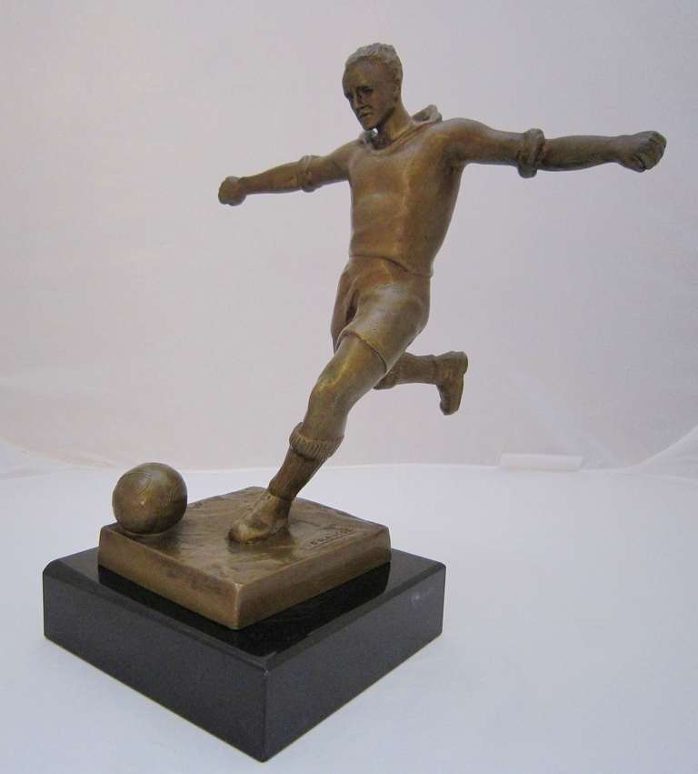 A French statuette or trophy figure of a goal shooting soccer player signed by the artist, Edouard Fraisse.

Born in Beaune on 14 May 1880, died in Paris on 13 September 1945, Fraisse was a sculptor, engraver, and medalist, whose works were mostly