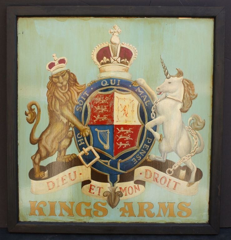 An authentic English pub sign (two-sided) featuring a painting of the British Royal Arms framed in black.<br />
<br />
A very fine example of vintage advertising artwork, ready for display.