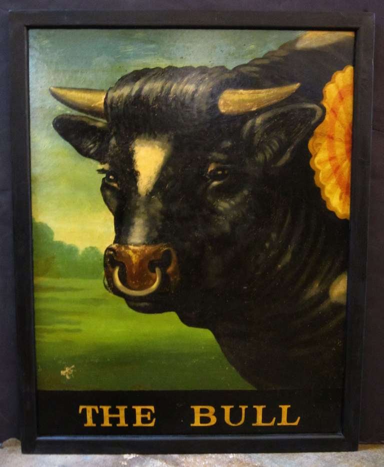 An authentic English pub sign (one-sided) featuring a painting of a black bull, entitled: The Bull

A very fine example of vintage advertising artwork, ready for display.