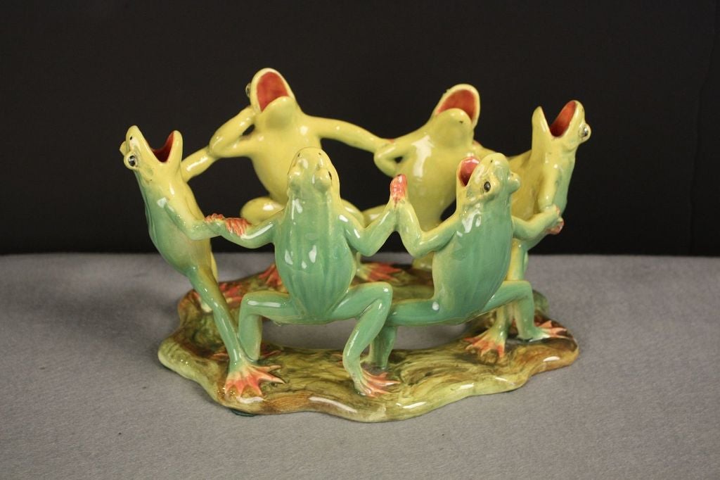 frogs dancing in a circle