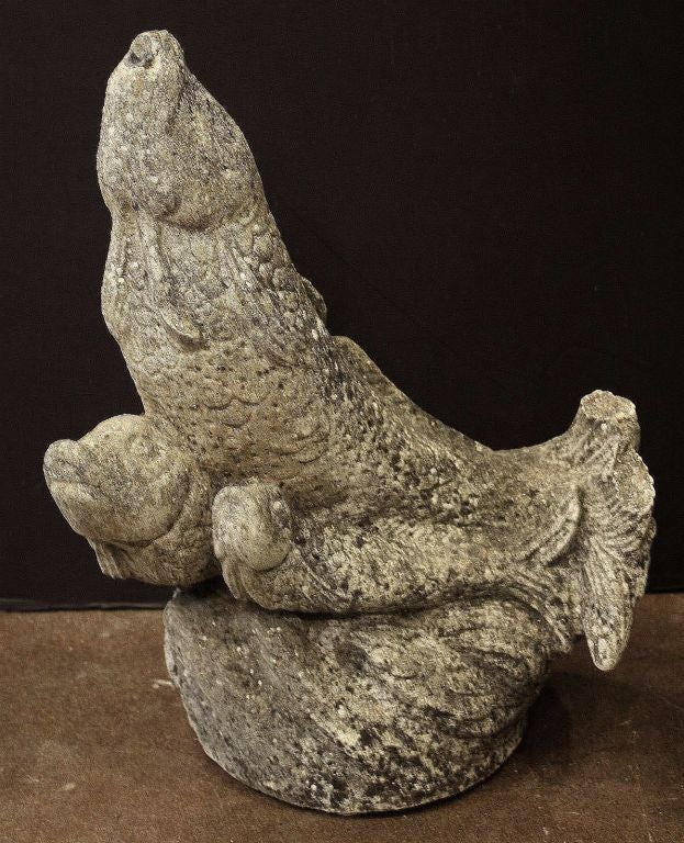 An English garden fountain of composition stone featuring a design of three fish in a upward arc.

Perfect for the garden room or conservatory!